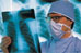 man looking at x-ray