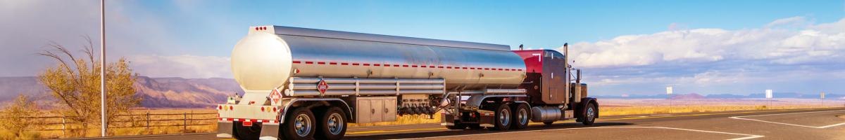 heavy-duty tanker trucks on rural road